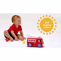 Bright Starts Roll & Pop Fire Truck Toy with Lights, Sounds and Ball-Popping Action